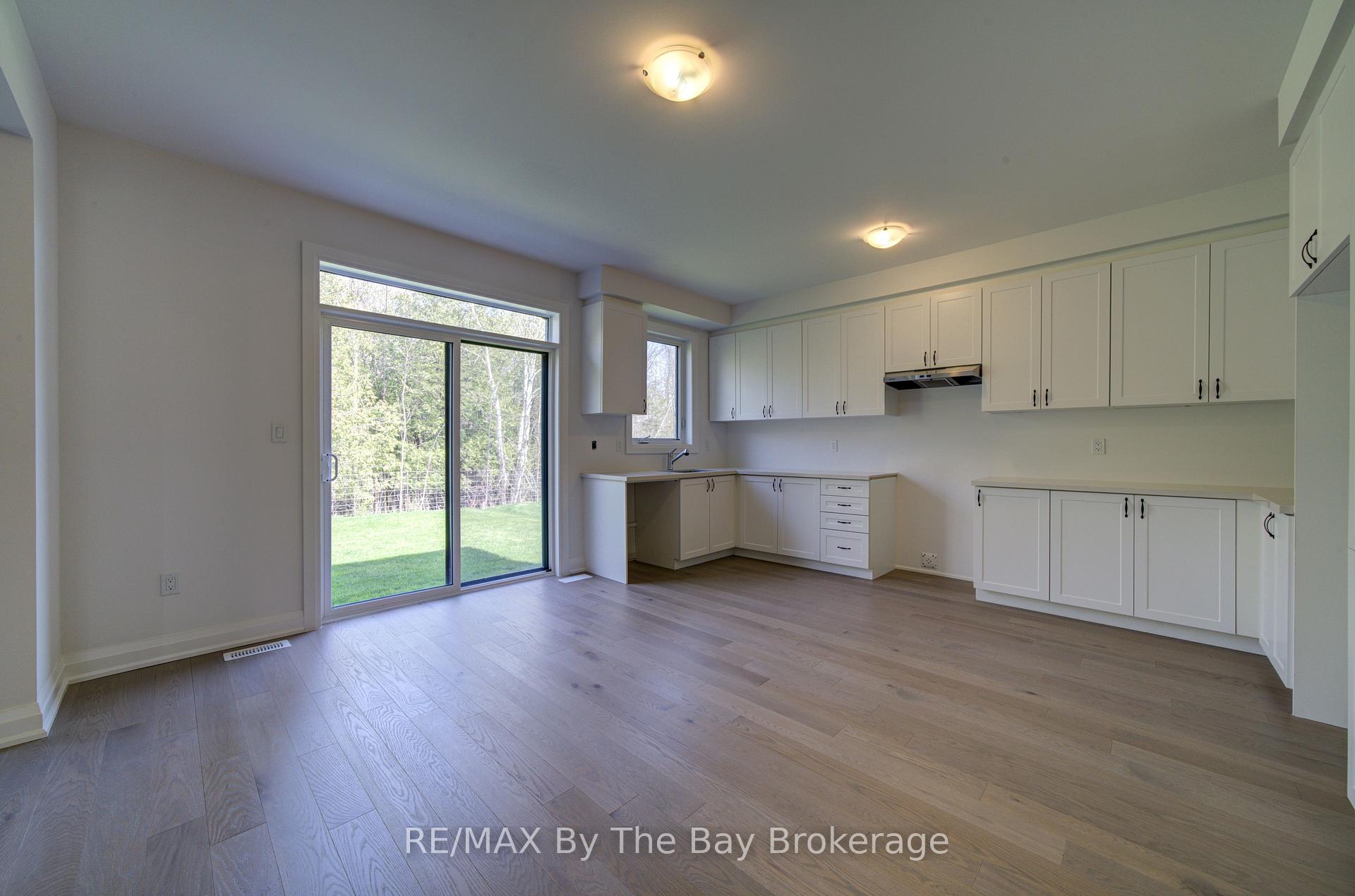 Photo 11 of 38 Amber Drive, Wasaga Beach — HOMEH