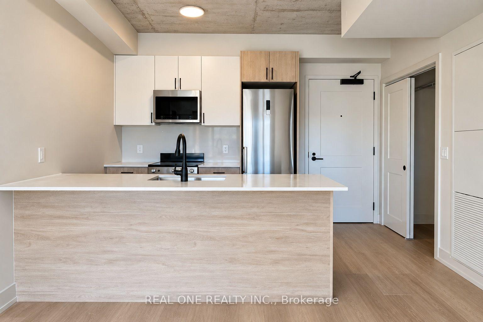 Photo 4 of Unit 413, 810 King Street W, Hamilton, Westdale — HOMEH