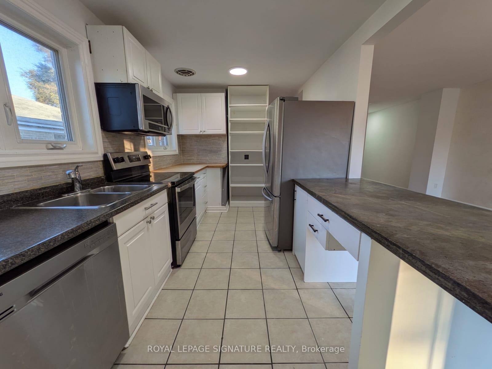 Photo 5 of 26 Trinnell Boulevard, Scarborough, Clairlea-Birchmount — HOMEH