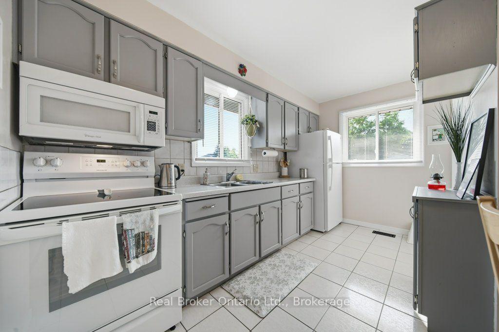 Photo 8 of 22 Mountford Drive, Guelph, Grange Road — HOMEH