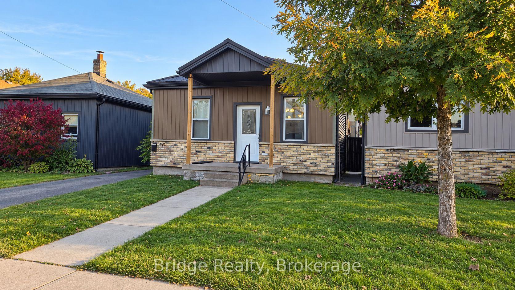 Photo 1 of 497 Simcoe Street, London, East K — HOMEH