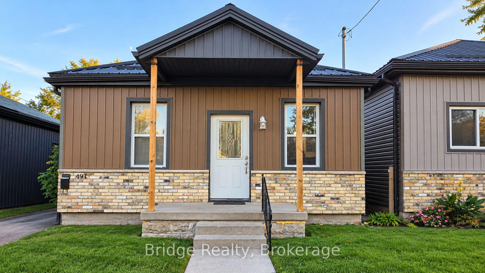 Photo 2 of 497 Simcoe Street, London, East K — HOMEH