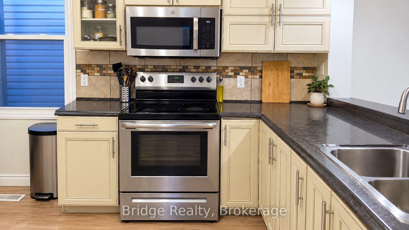 Photo 7 of 497 Simcoe Street, London, East K — HOMEH