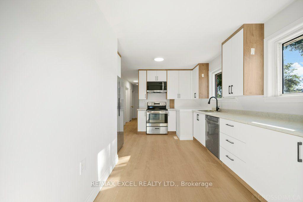 Photo 10 of 65 Wilson Road N, Oshawa, O'Neill — HOMEH
