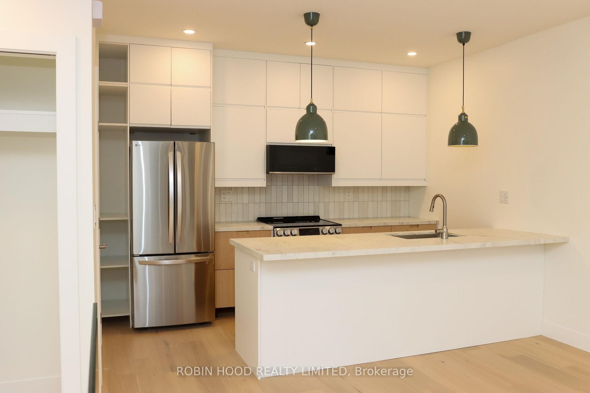 Photo 2 of Unit 2, 247 Pacific Avenue, Toronto, High Park North — HOMEH