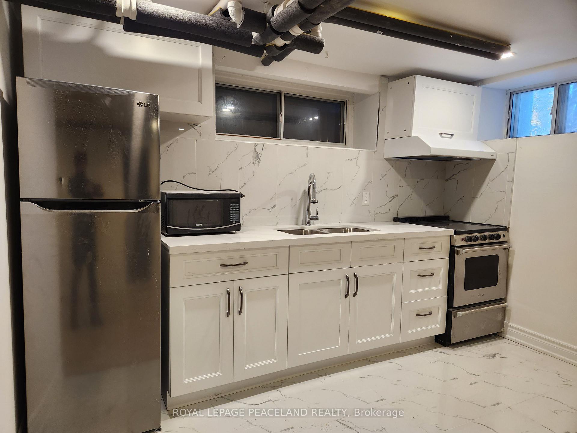 Photo of Unit Rear Bsmt, 61 Madison Avenue