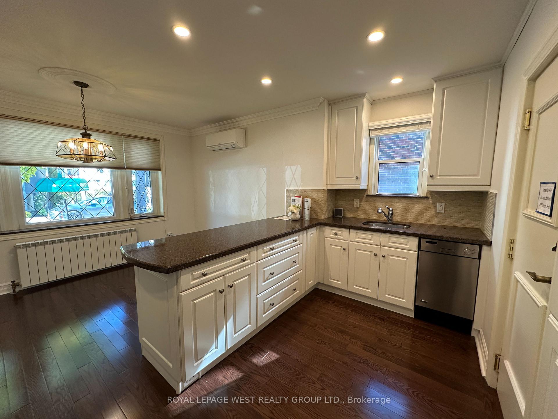 Photo 2 of Unit 1, 27 Mossom Road W, Toronto, High Park-Swansea — HOMEH