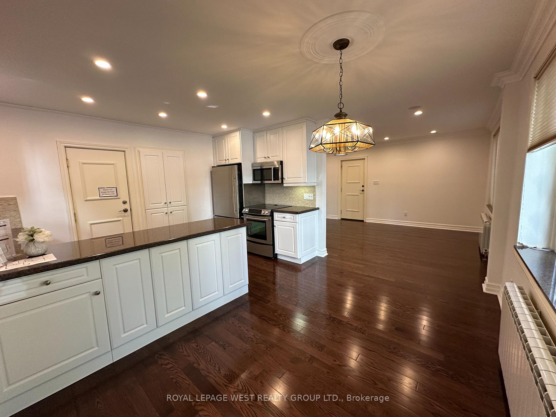 Photo 3 of Unit 1, 27 Mossom Road W, Toronto, High Park-Swansea — HOMEH