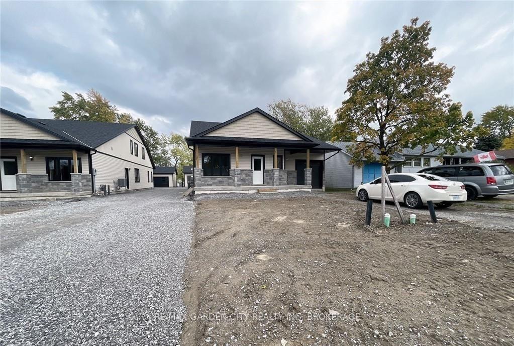 Photo 2 of Unit 4-LOWER LEVEL, 13 Valley Road, St. Catharines, Western Hill — HOMEH
