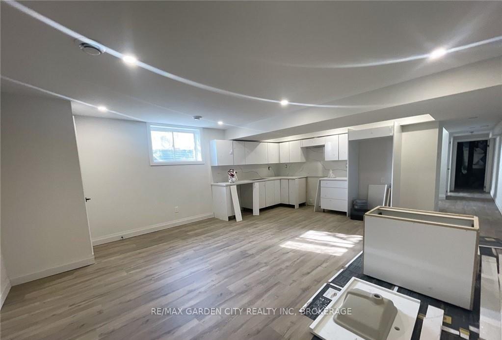 Photo 3 of Unit 4-LOWER LEVEL, 13 Valley Road, St. Catharines, Western Hill — HOMEH