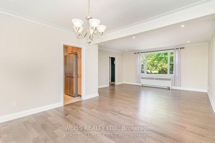 Photo 4 of 65 Prince Charles Drive, Toronto, Englemount-Lawrence — HOMEH