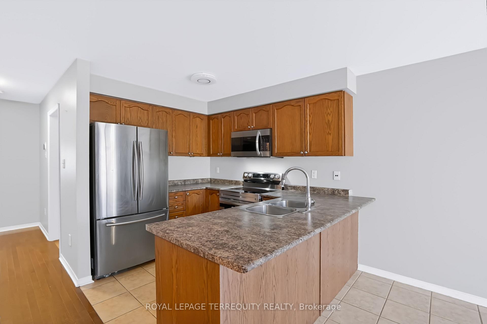Photo 9 of Unit 19, 253 Sprucewood Crescent W, Clarington, Bowmanville — HOMEH