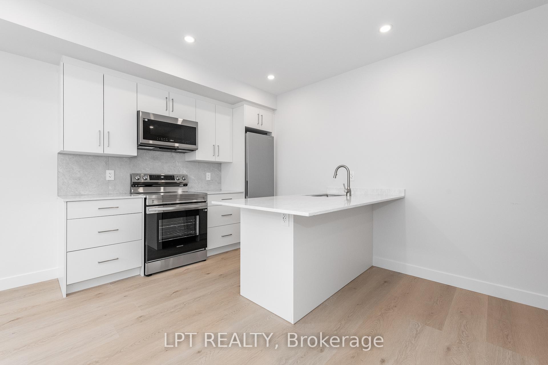 Photo 3 of Unit 2, 319 Shakespeare Street, Ottawa, Vanier — HOMEH