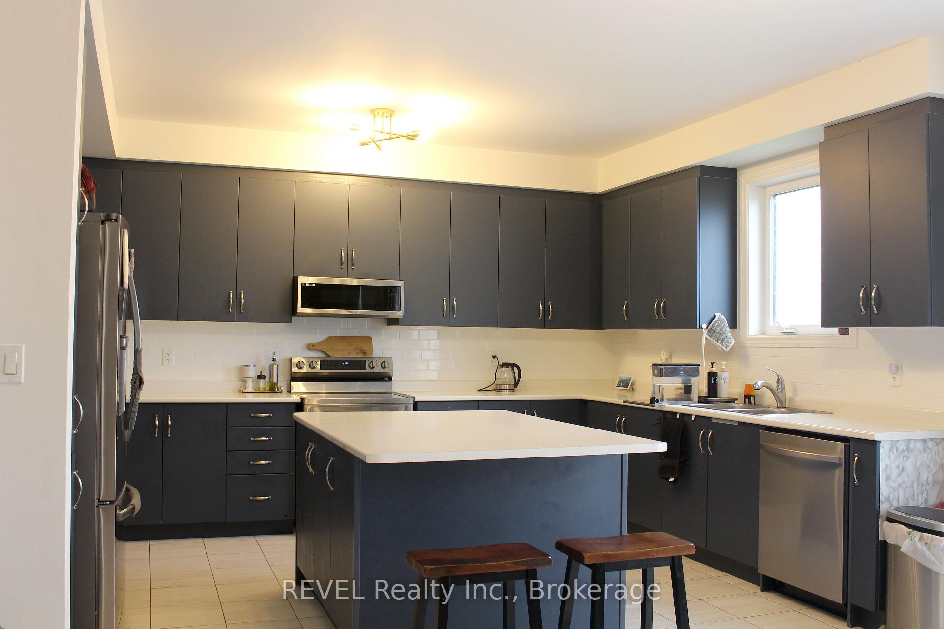 Photo 22 of 58 Oriole Crescent, Port Colborne, Main Street — HOMEH