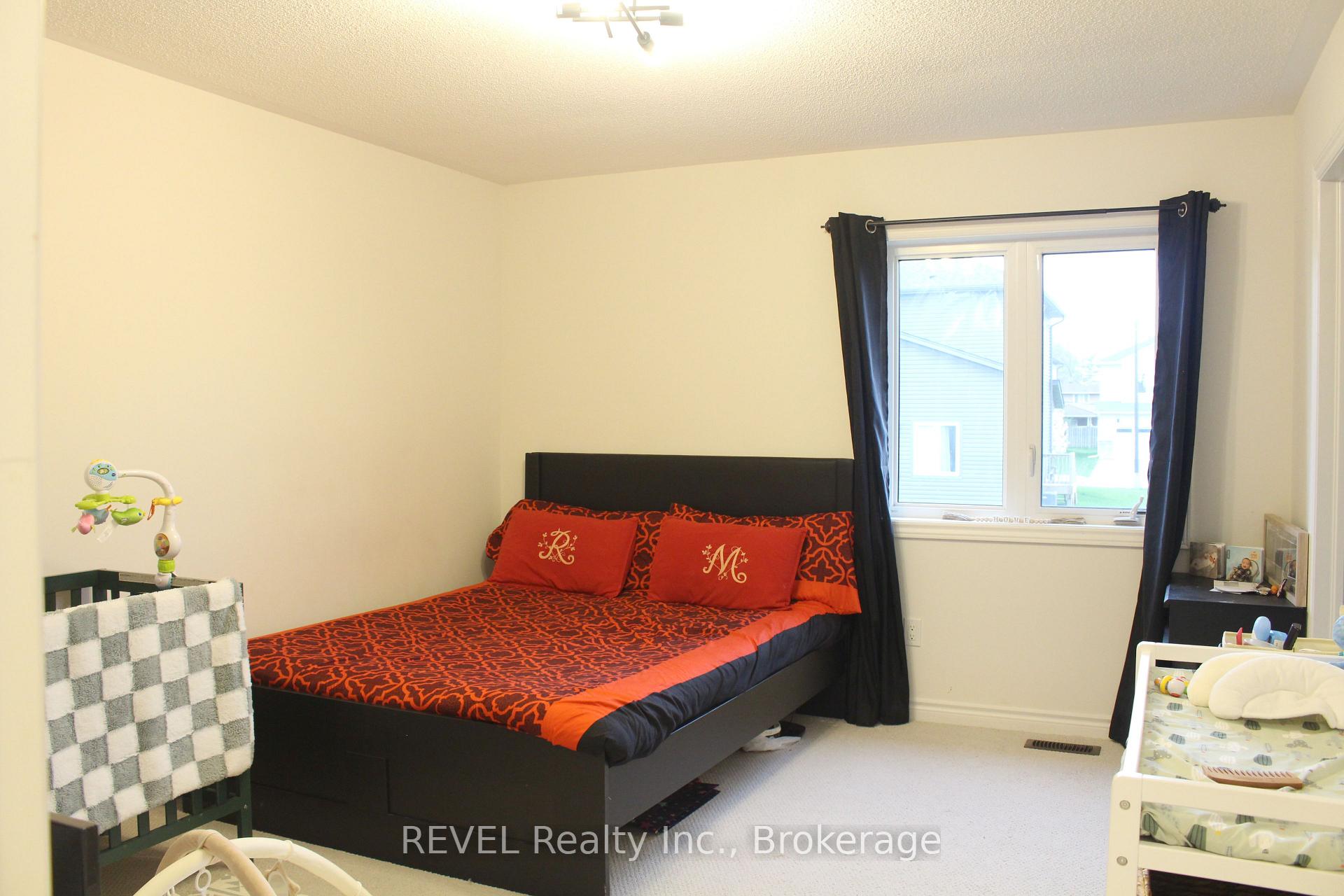 Photo 33 of 58 Oriole Crescent, Port Colborne, Main Street — HOMEH