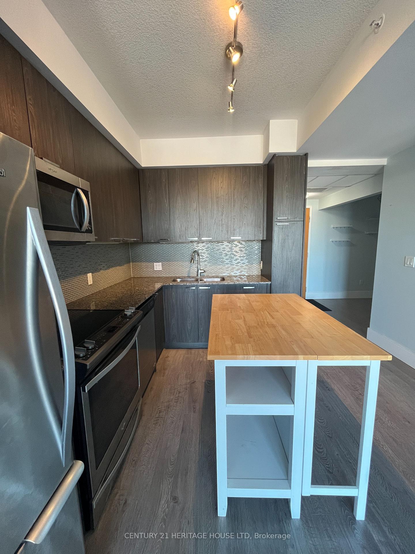 Photo 10 of Unit 402, 155 St Leger Street, Kitchener, Mount Hope Huron Park — HOMEH