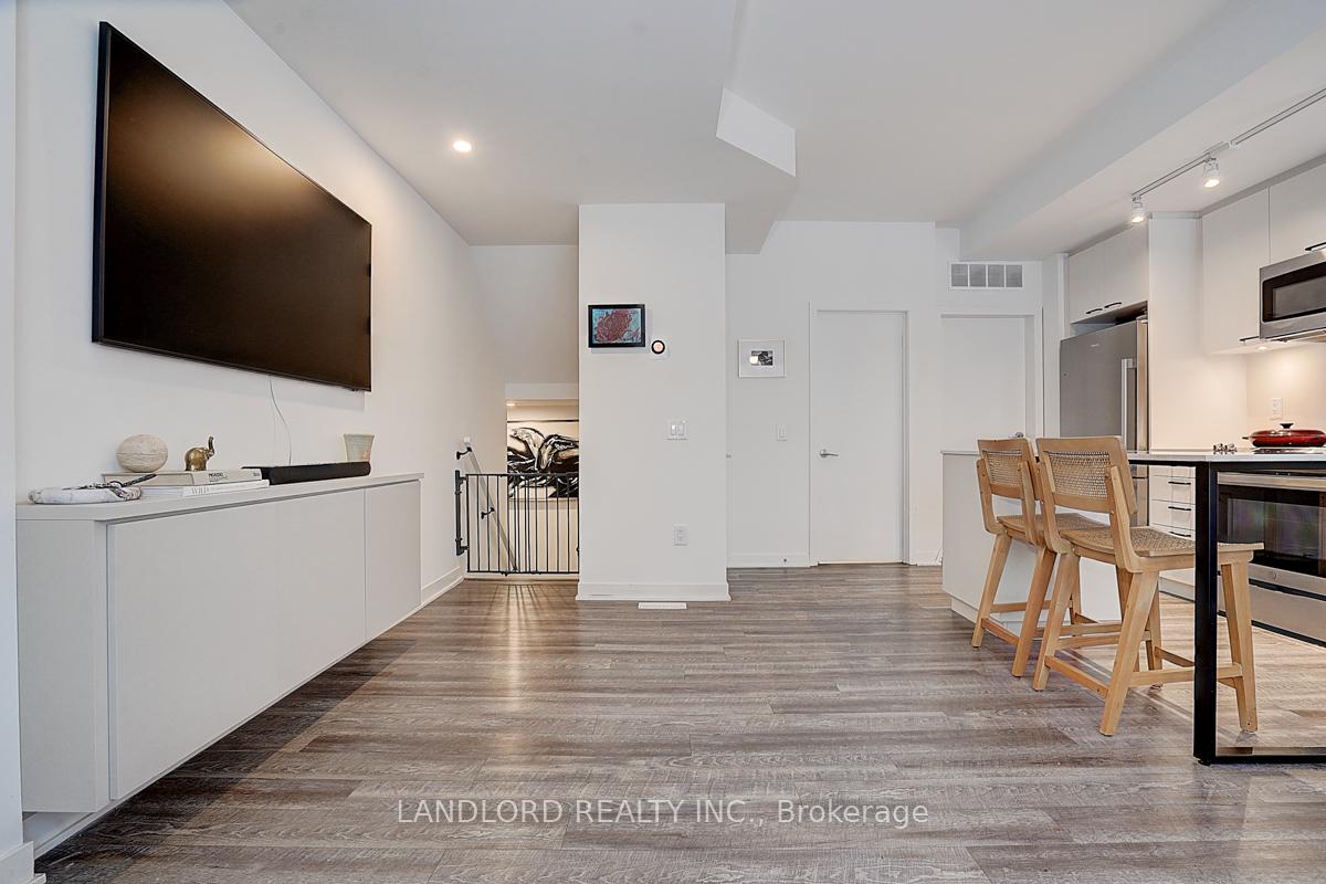 Photo 7 of Unit TH13, 30 Ed Clark Gardens, Toronto, Weston-Pellam Park — HOMEH