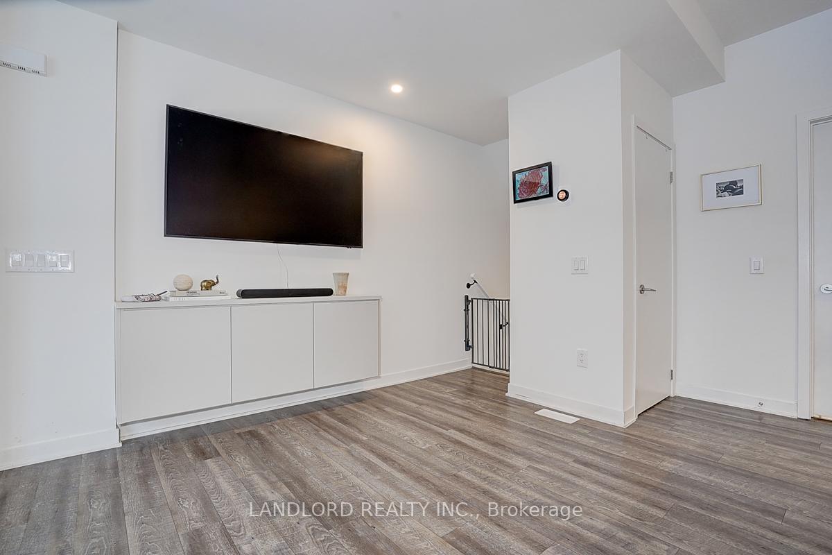 Photo 8 of Unit TH13, 30 Ed Clark Gardens, Toronto, Weston-Pellam Park — HOMEH