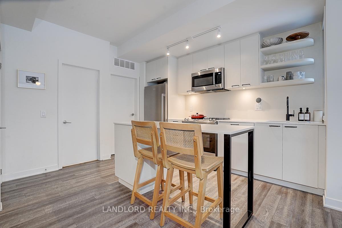 Photo 13 of Unit TH13, 30 Ed Clark Gardens, Toronto, Weston-Pellam Park — HOMEH