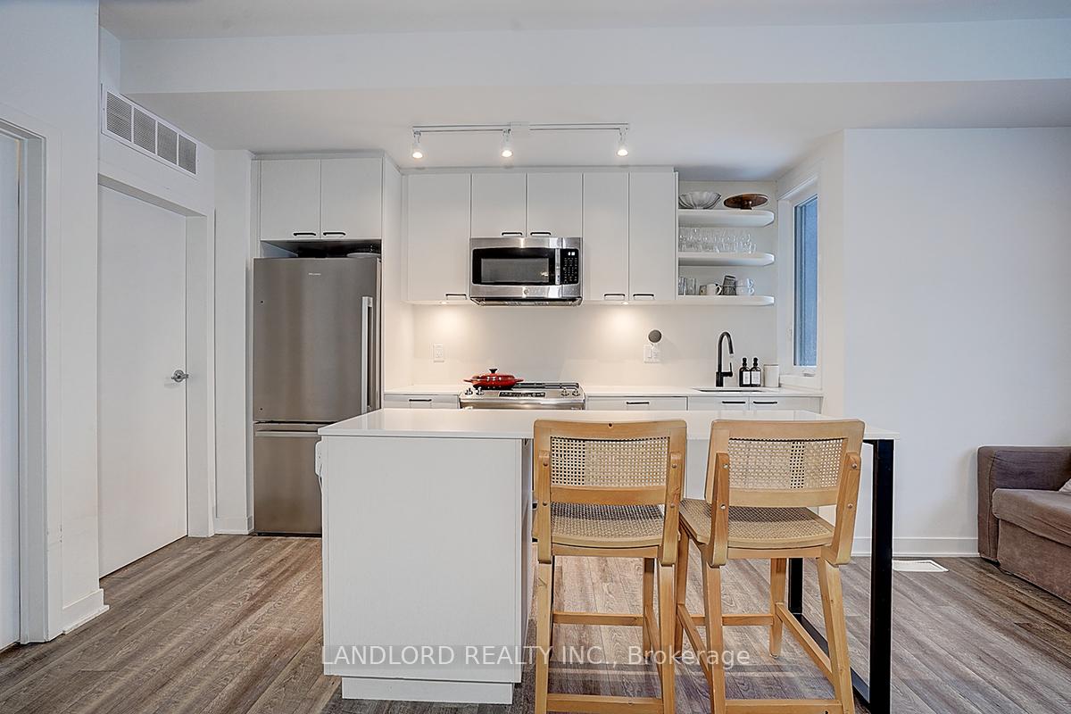 Photo 14 of Unit TH13, 30 Ed Clark Gardens, Toronto, Weston-Pellam Park — HOMEH