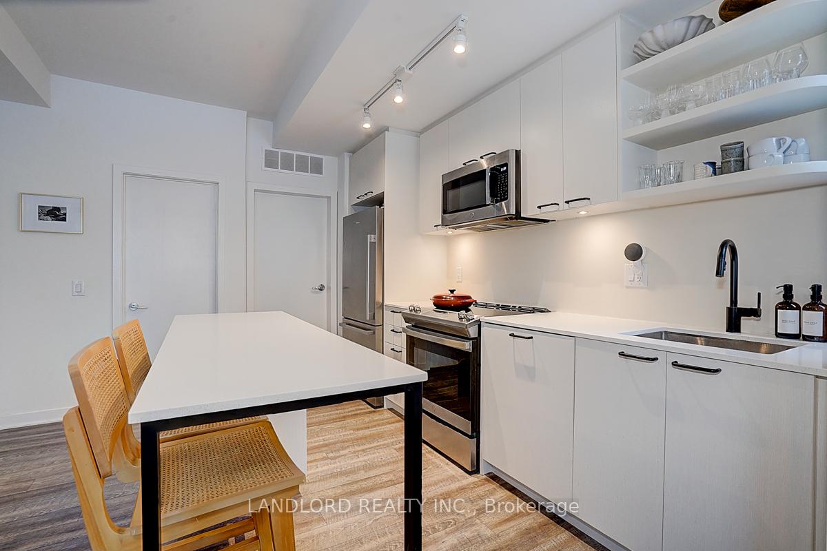 Photo 18 of Unit TH13, 30 Ed Clark Gardens, Toronto, Weston-Pellam Park — HOMEH