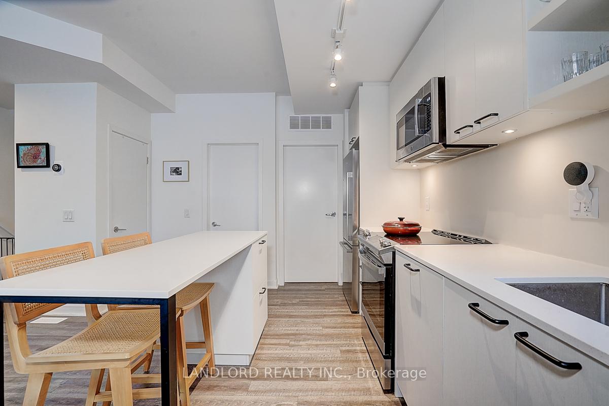 Photo 19 of Unit TH13, 30 Ed Clark Gardens, Toronto, Weston-Pellam Park — HOMEH