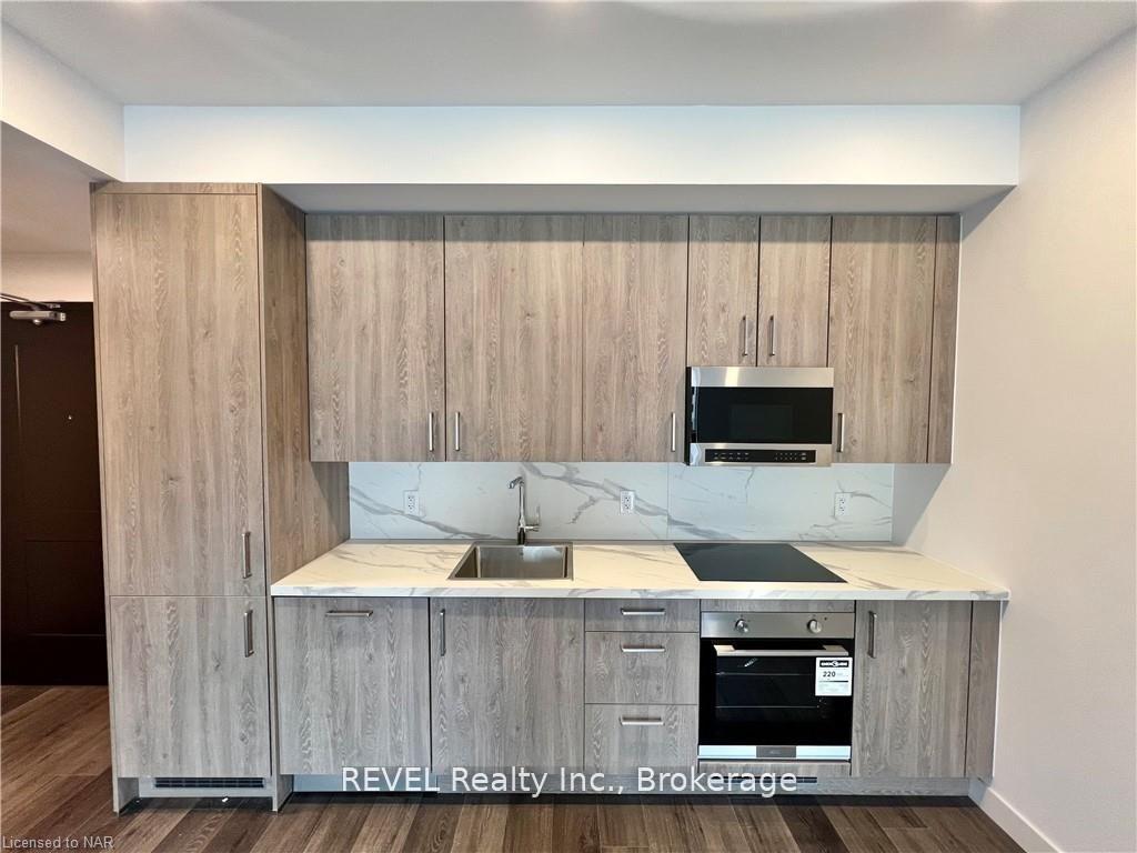 Photo 3 of Unit 213, 7549 Kalar Road, Niagara Falls, Brown — HOMEH