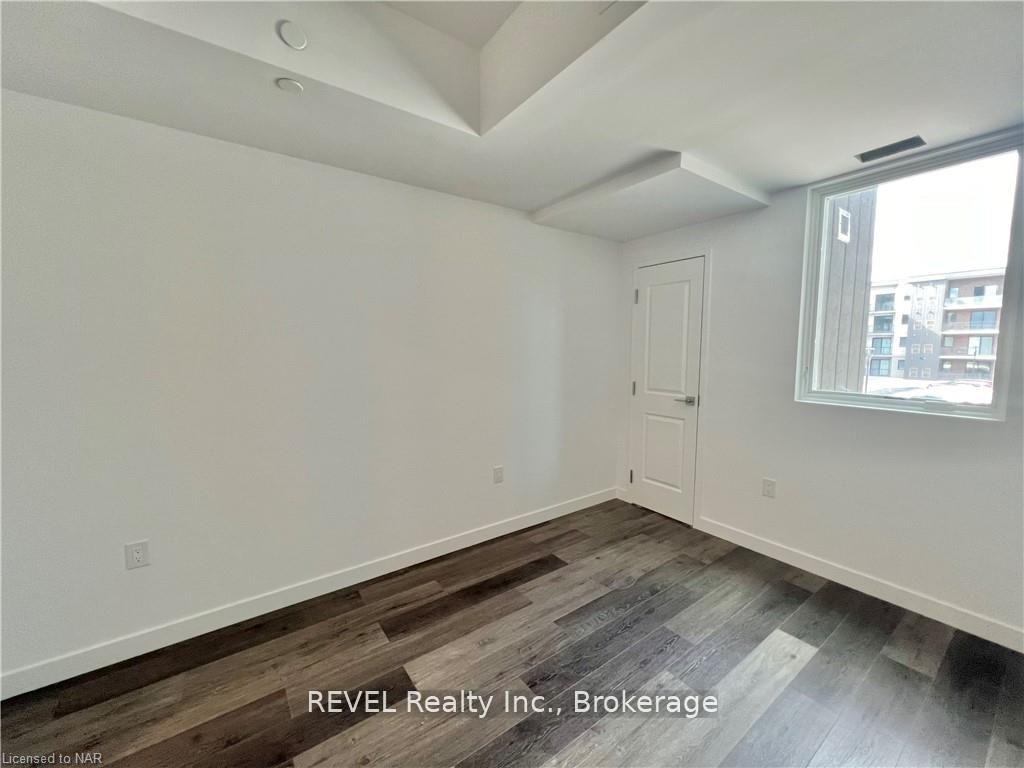 Photo 8 of Unit 213, 7549 Kalar Road, Niagara Falls, Brown — HOMEH