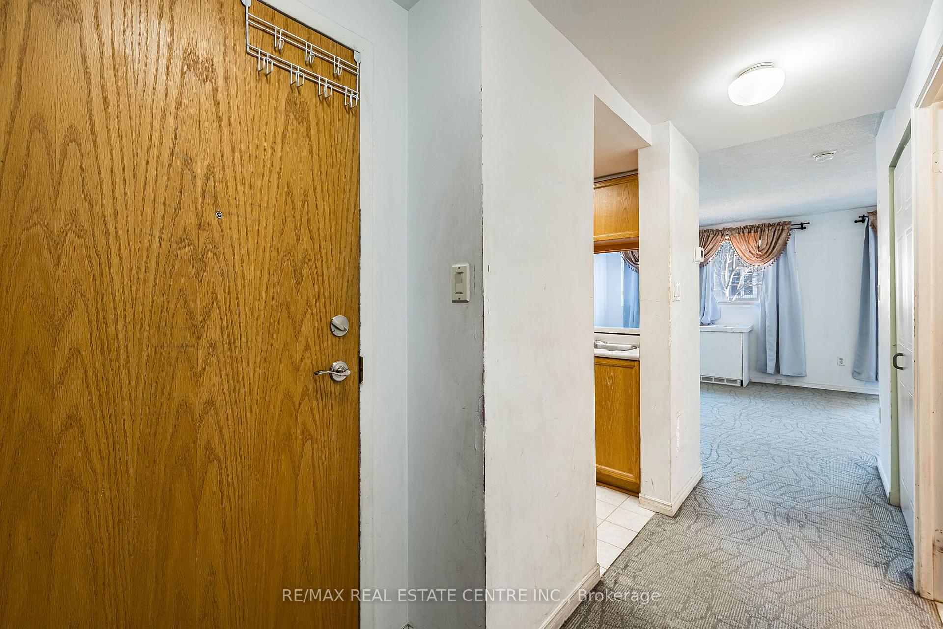 Photo 4 of Unit 101, 8351 McLaughlin Road S, Brampton, Brampton South — HOMEH