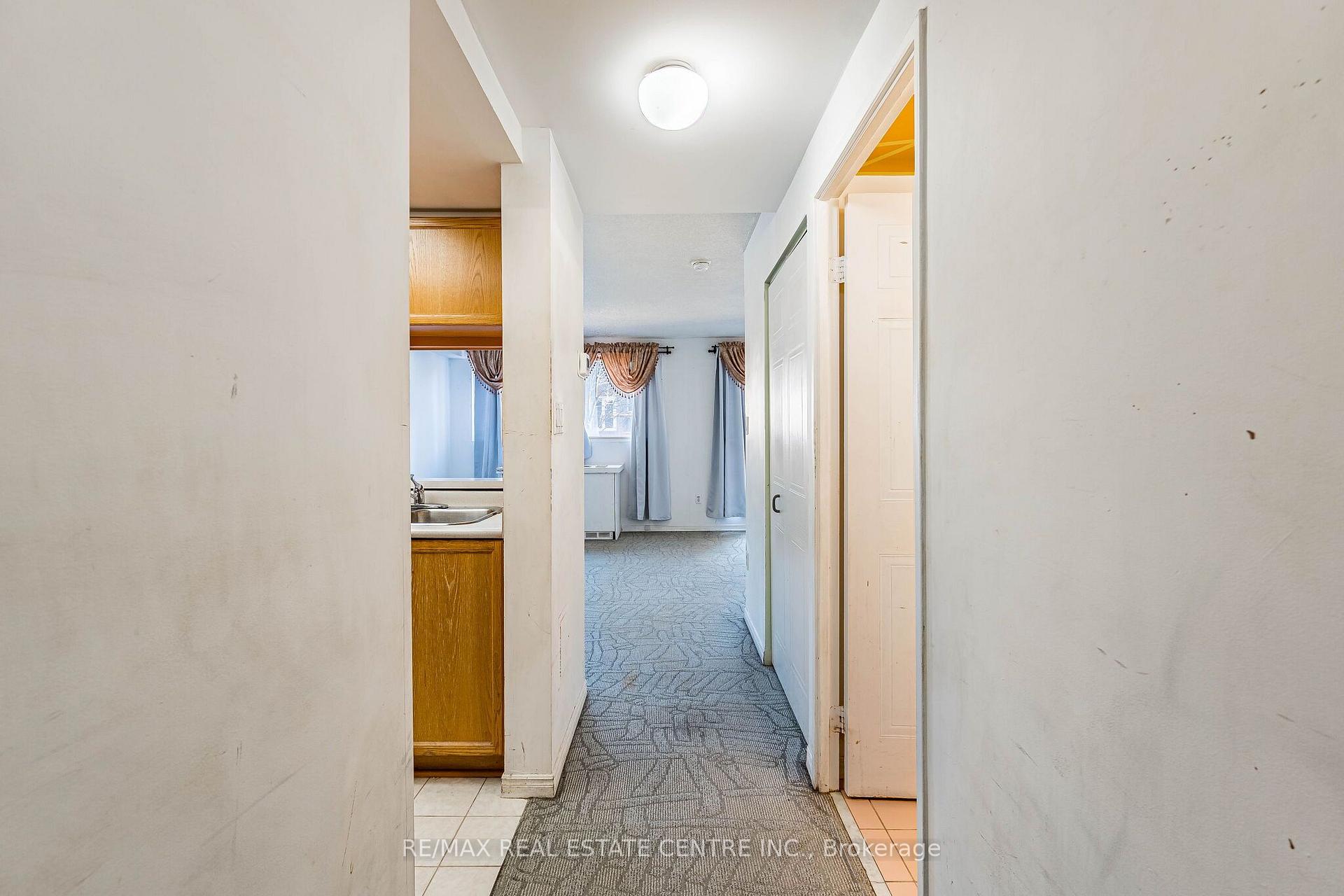 Photo 5 of Unit 101, 8351 McLaughlin Road S, Brampton, Brampton South — HOMEH