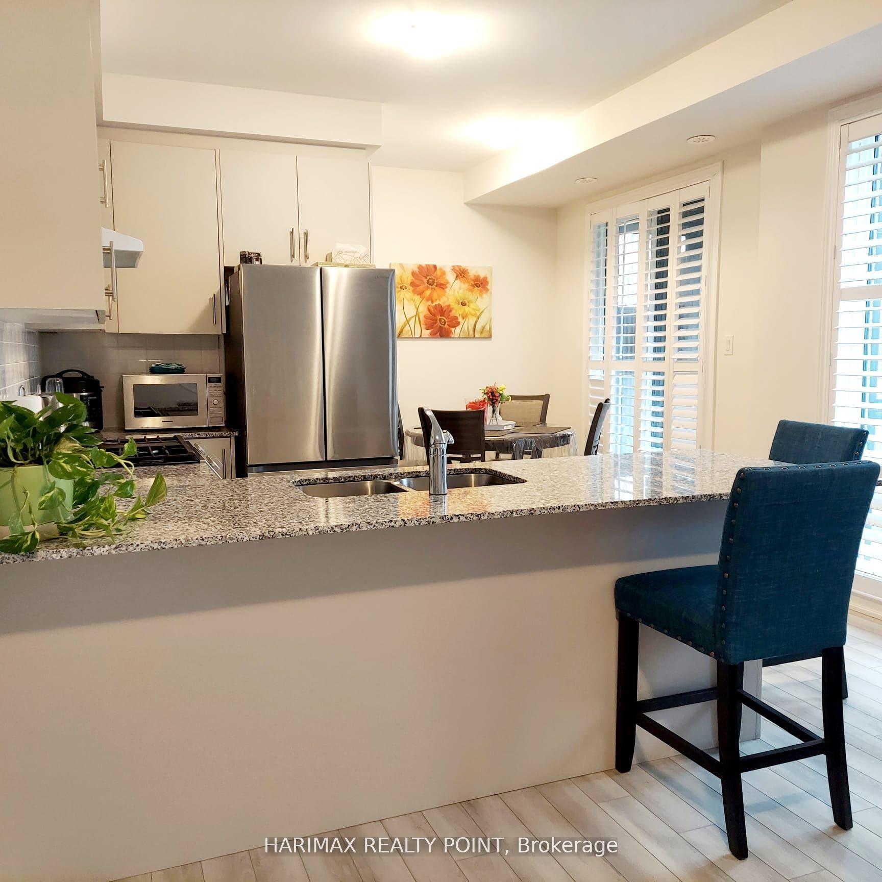 Photo 5 of Unit 25, 40 Knotsberry Circle, Brampton, Bram West — HOMEH