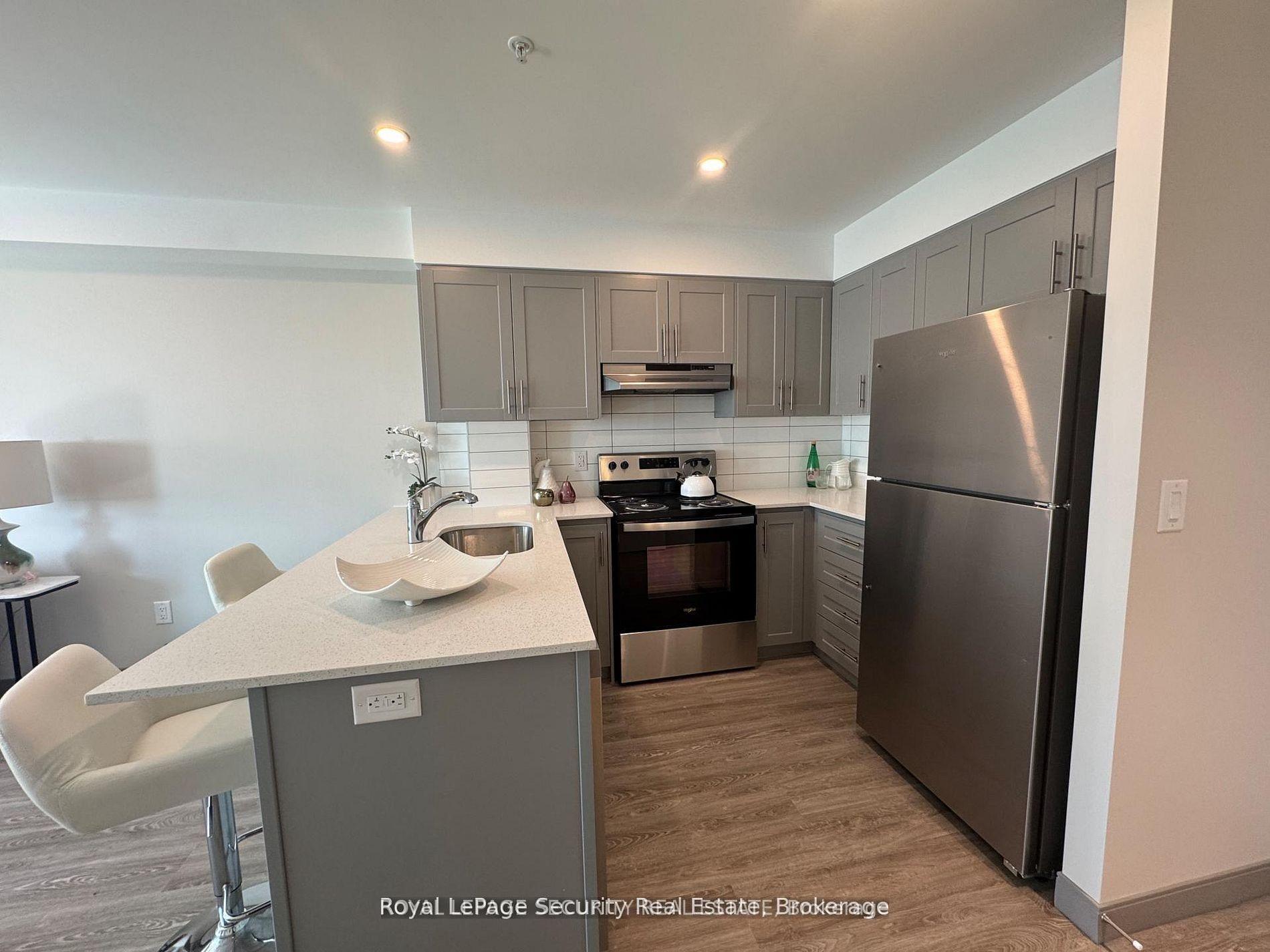 Photo 8 of Unit 710, 1015 Innisfil Beach Road, Innisfil, Alcona — HOMEH