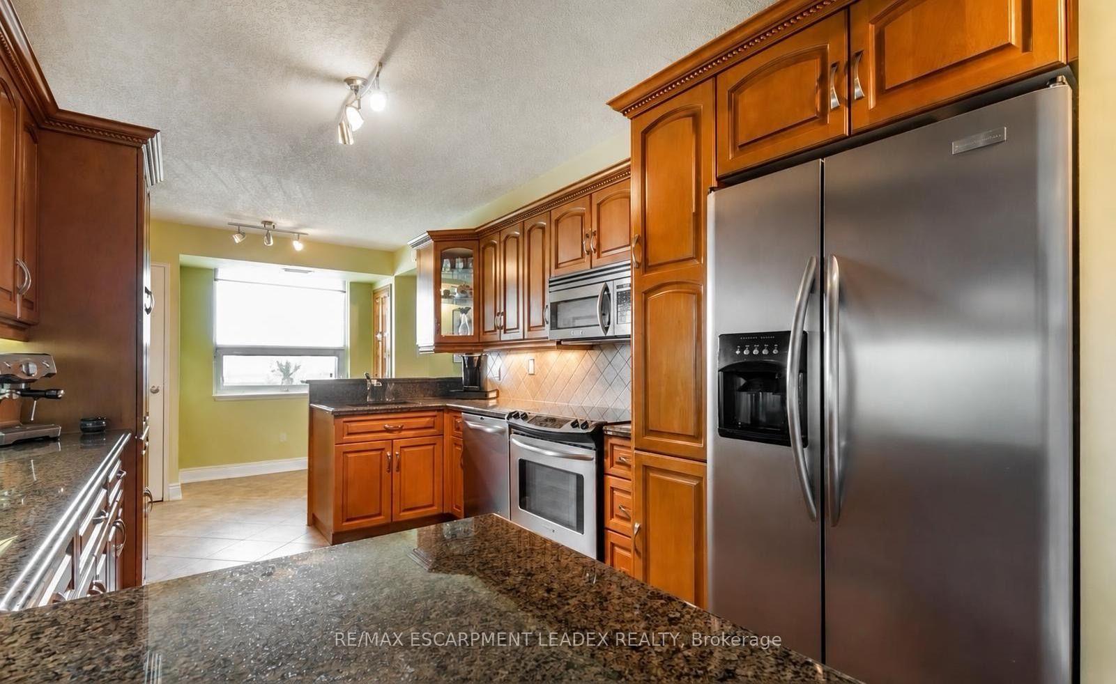 Photo 4 of Unit 705, 500 Green Road, Hamilton, Lakeshore — HOMEH