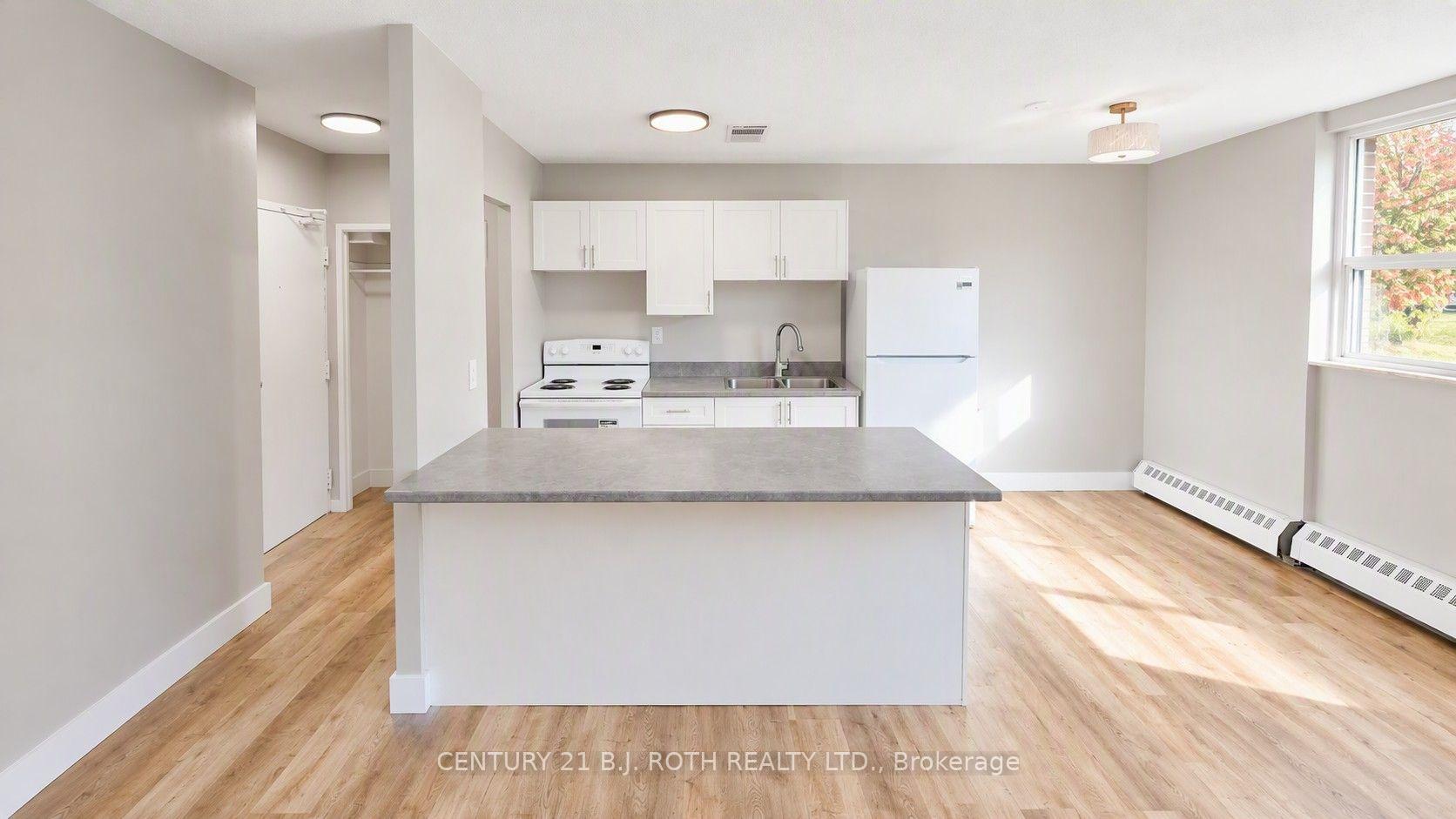 Photo 4 of Unit 103, 98 Holgate Street, Barrie, Allandale — HOMEH