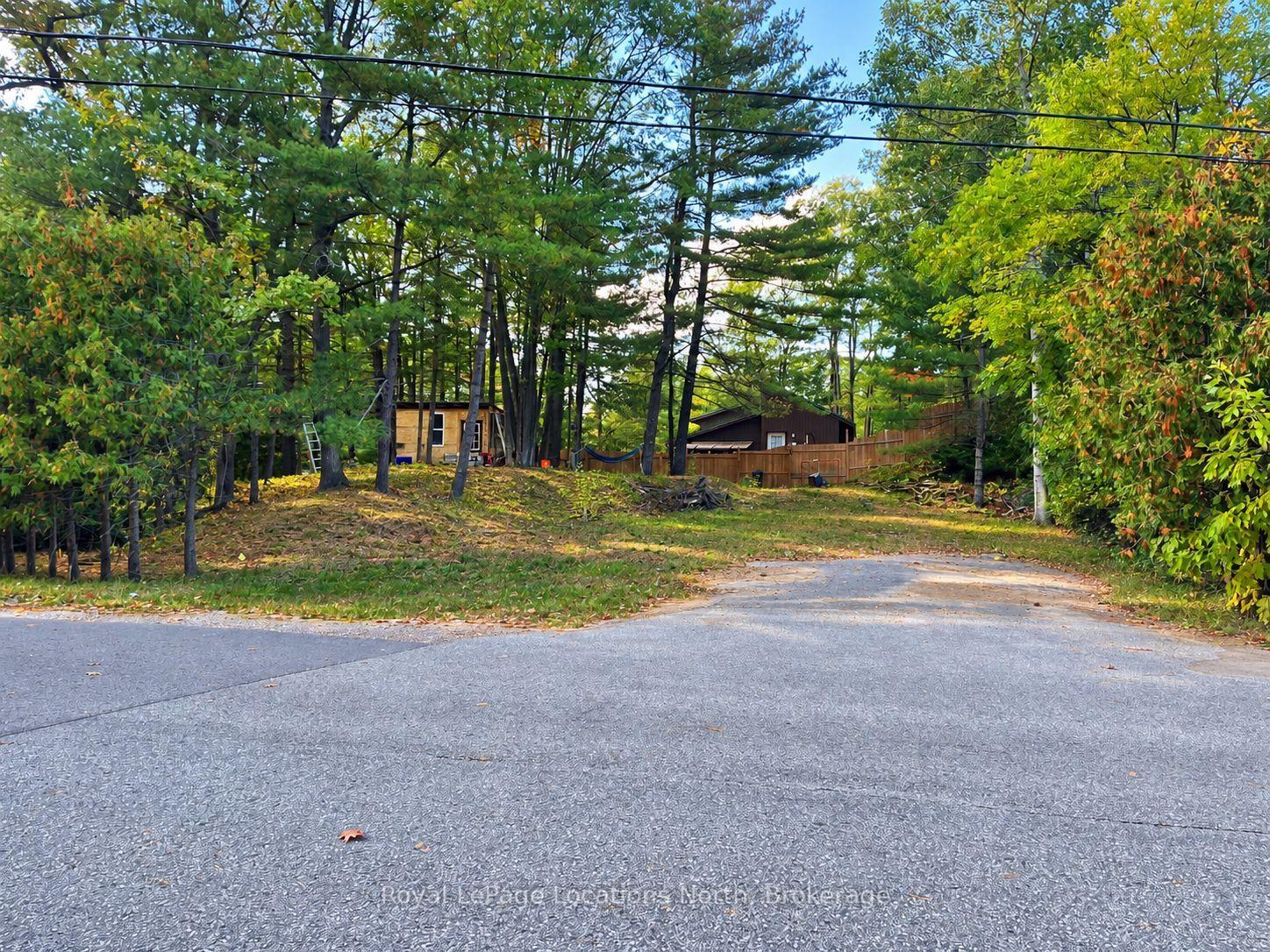 Photo 4 of 315 Sunnidale Road S, Wasaga Beach — HOMEH