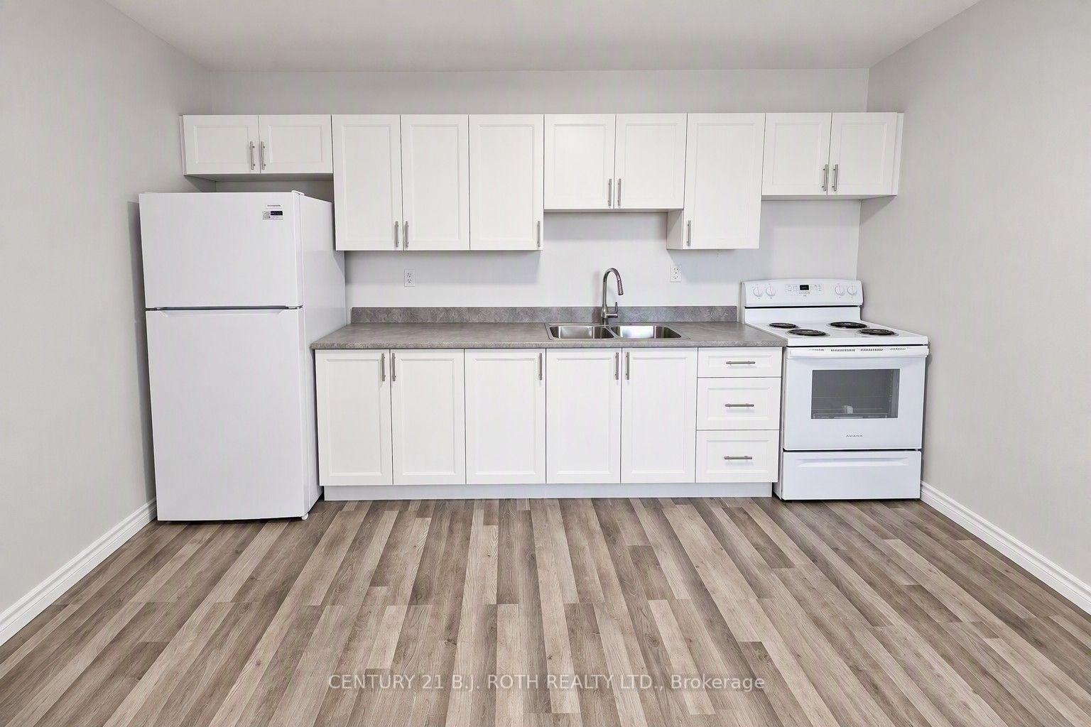 Photo 13 of Unit 405, 90 Holgate Street, Barrie, Allandale — HOMEH