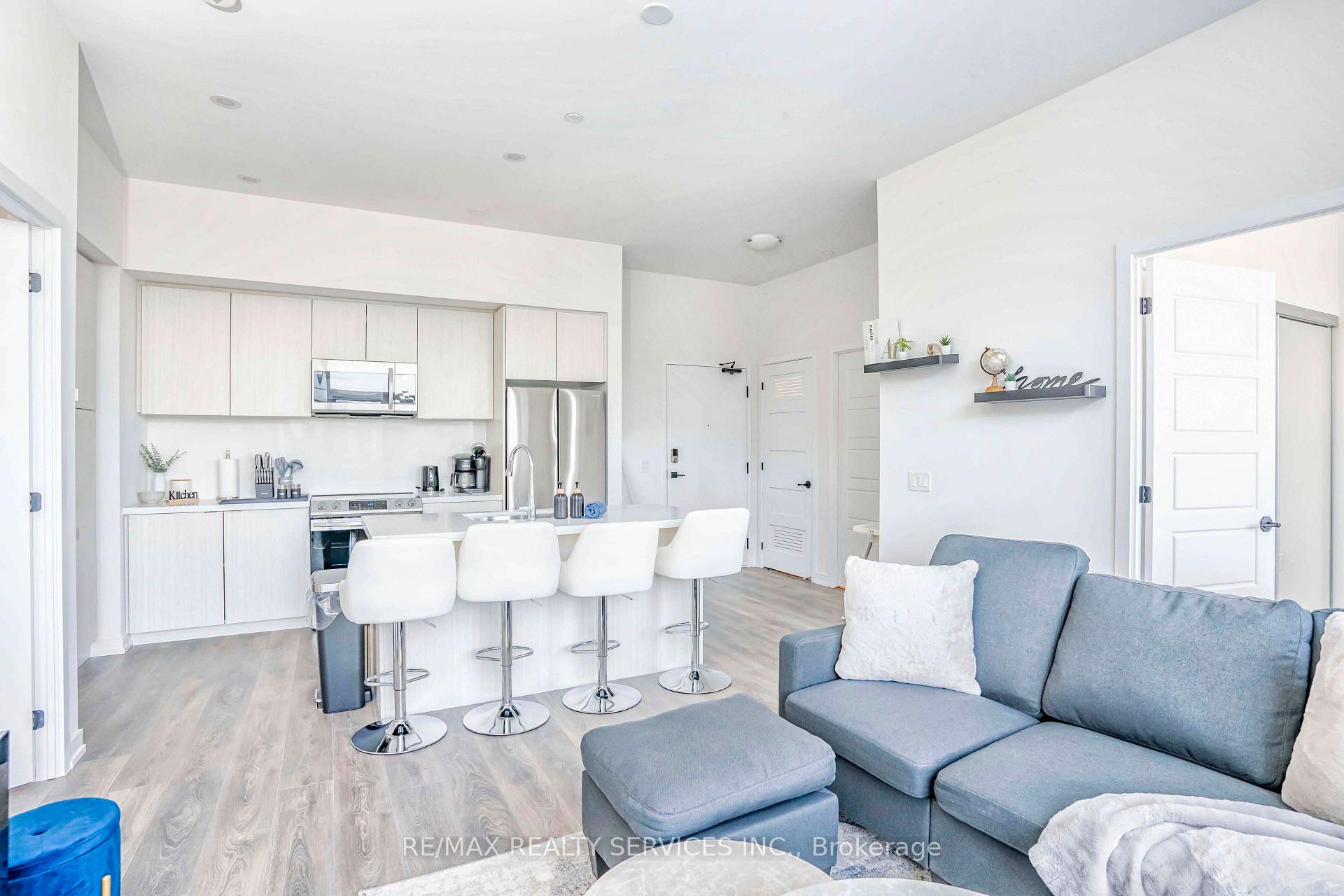 Photo 8 of Unit 403, 415 Sea Ray Avenue, Innisfil, Rural Innisfil — HOMEH