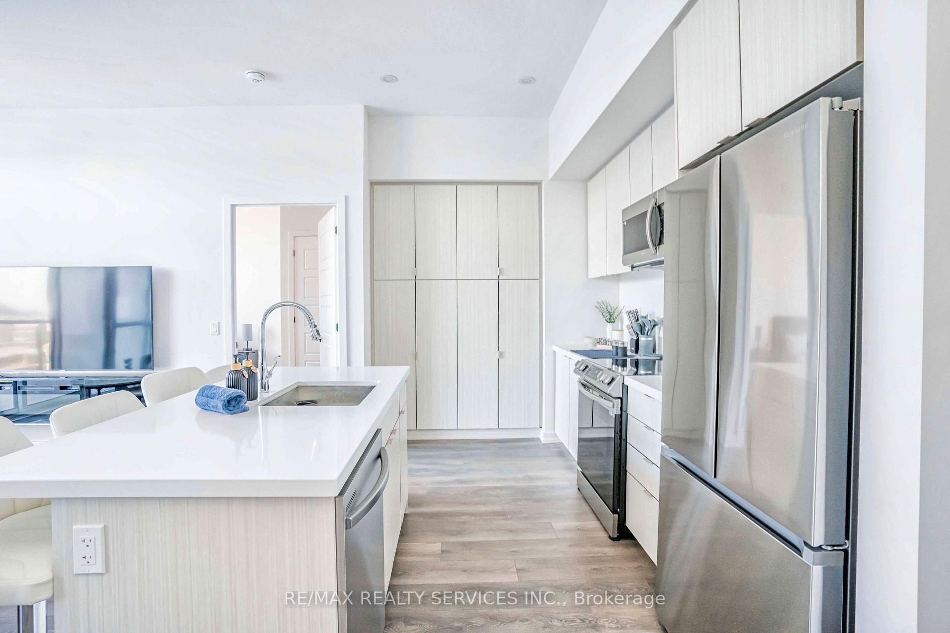 Photo 10 of Unit 403, 415 Sea Ray Avenue, Innisfil, Rural Innisfil — HOMEH