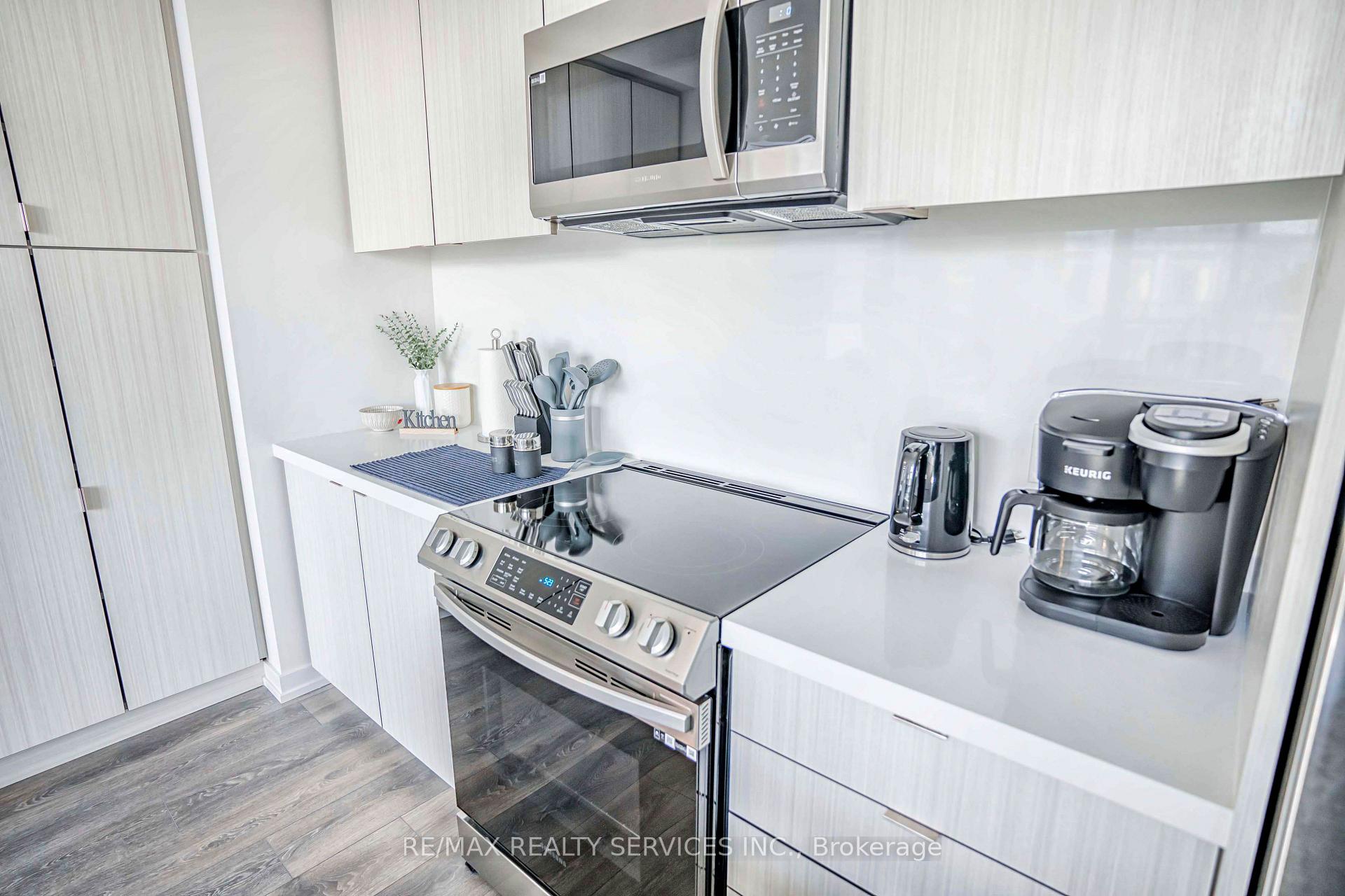 Photo 13 of Unit 403, 415 Sea Ray Avenue, Innisfil, Rural Innisfil — HOMEH
