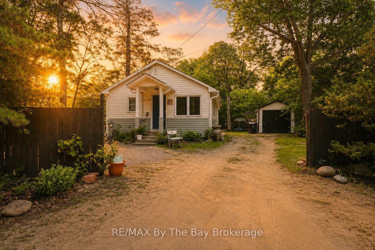 Photo 1 of 217 Dunkerron Avenue, Wasaga Beach — HOMEH