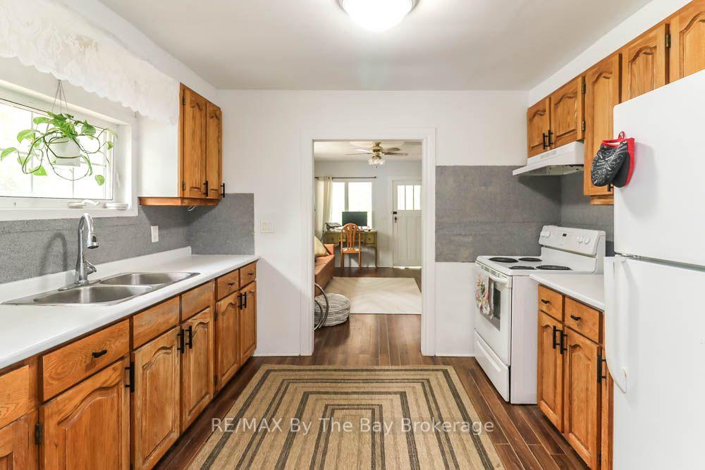 Photo 5 of 217 Dunkerron Avenue, Wasaga Beach — HOMEH