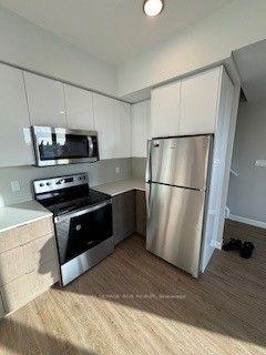 Front of Unit 112, 708 Woolwich Street