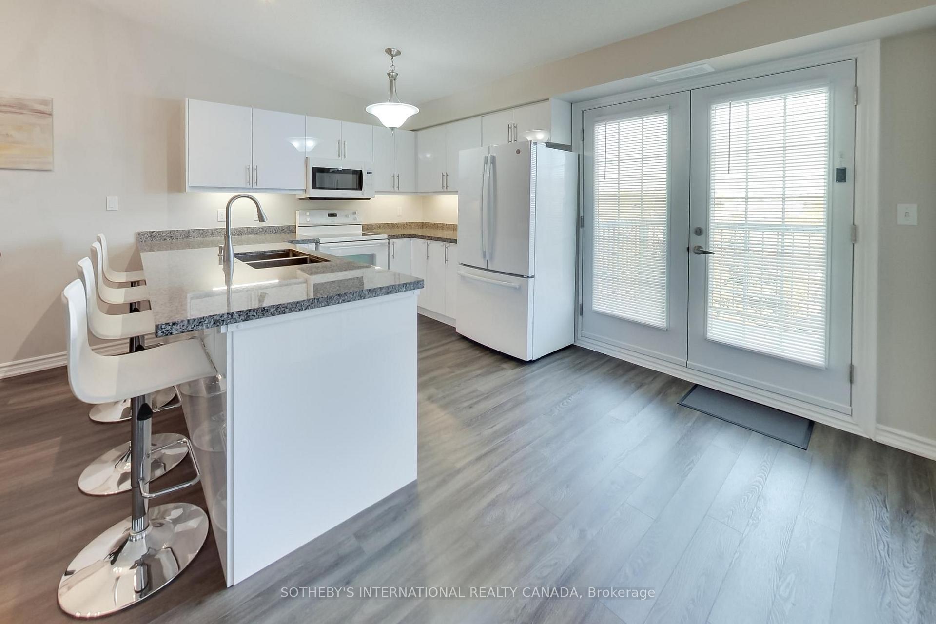 Photo 4 of Unit 402, 1830 Walker's Line, Burlington, Palmer — HOMEH