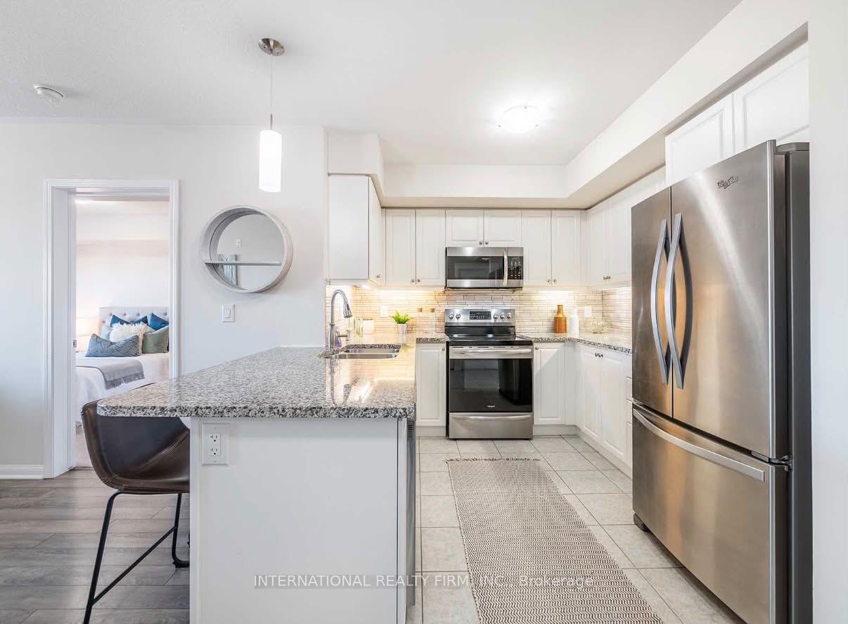Photo 2 of Unit 406, 60 Baycliffe Crescent, Brampton, Northwest Brampton — HOMEH