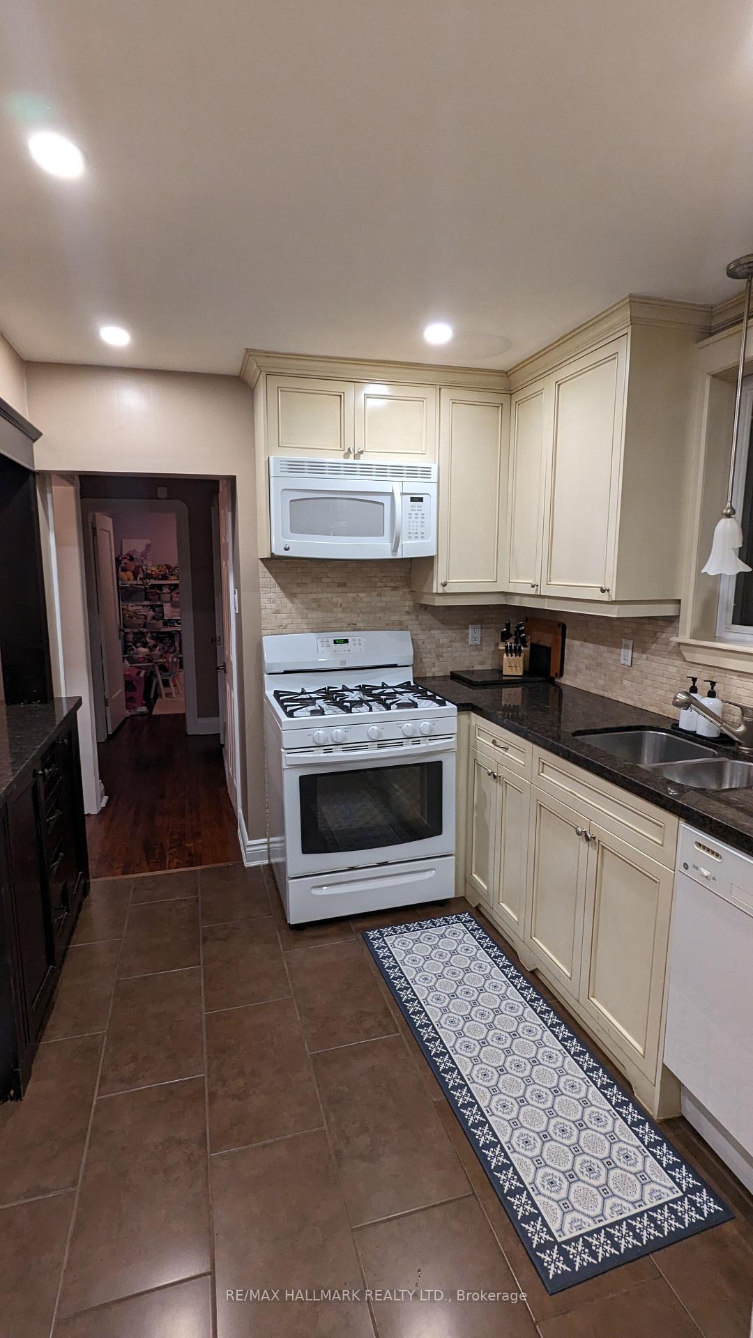Photo 4 of 342 Whitmore Avenue, North York, Briar Hill-Belgravia — HOMEH