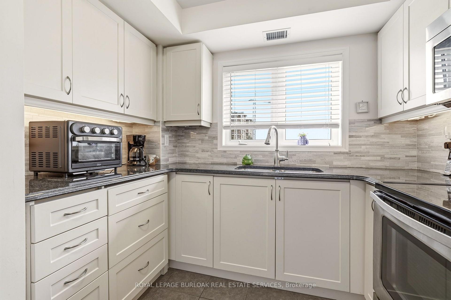 Photo 8 of Unit 309, 1045 Nadalin Heights, Milton, Willmott — HOMEH