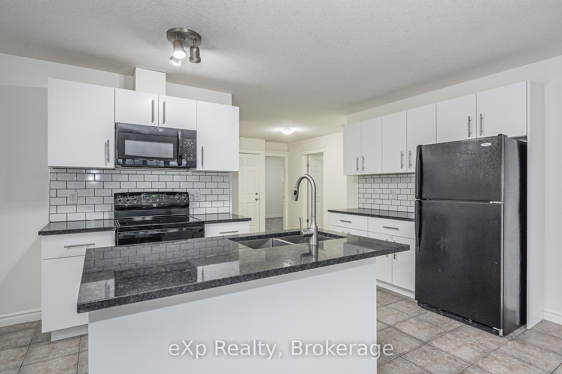 Photo 7 of Unit UPPER, 62 Victoria Road N, Guelph, St. George's — HOMEH