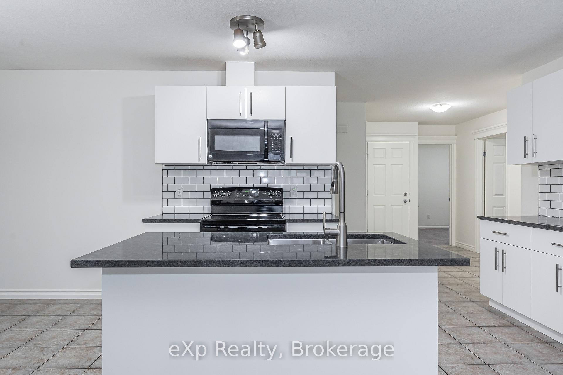 Photo 8 of Unit UPPER, 62 Victoria Road N, Guelph, St. George's — HOMEH