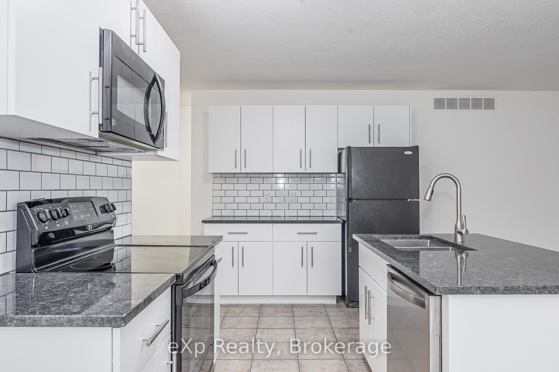 Photo 10 of Unit UPPER, 62 Victoria Road N, Guelph, St. George's — HOMEH