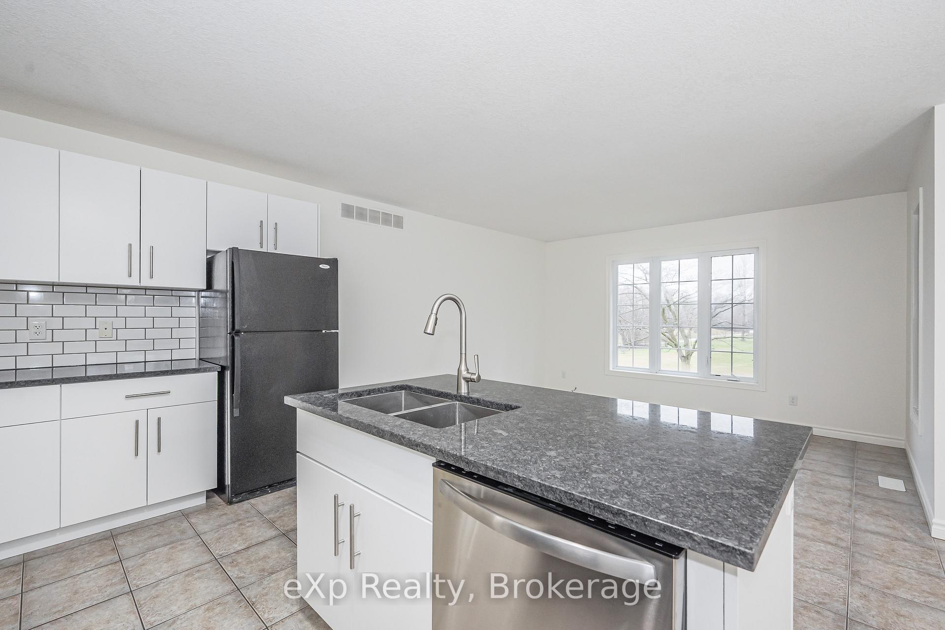 Photo 11 of Unit UPPER, 62 Victoria Road N, Guelph, St. George's — HOMEH